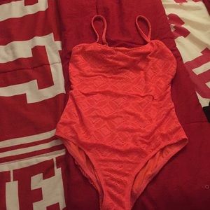 Blue and pink bathing suits